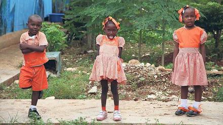 Zu Späßen aufgelegt. Diese Kinder gehen zwei Jahre nach dem Beben in Port-au-Prince wieder zur Schule. 