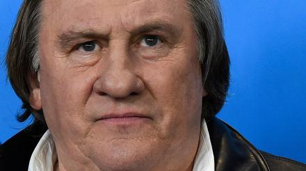 French actor Gerard Depardieu poses during a photocall for the film „Saint Amour“ presented during the 66th Berlinale Film Festival in Berlin on February 19, 2016. 