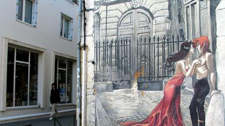 It's a Man's World. Angoulême ist für sein Comicfestival berühmt - und für seine damit korrespondierenden Wandgemälde. Dieses stammt von Comiczeichner Yslaire.