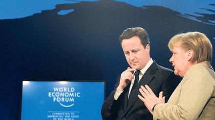 Vorhut. Bundeskanzlerin Merkel und der britische Regierungschef Cameron beim Weltwirtschaftsforum in Davos. 
