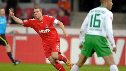 Podolski jubelt, Silvestre grummelt: Köln schlägt Bremen unter anderem durch zwei Tore des deutsche Nationalspielers.
