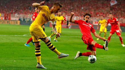 Tiefflieger. Neven Subotic (rechts) und der 1. FC Union hatten Marco Reus' Dortmunder gut im Griff.